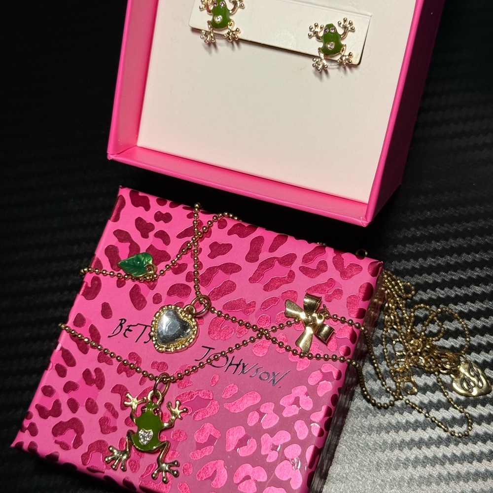 the "Ribbit Frog" or "Leave Frog" collection from Betsey Johnson